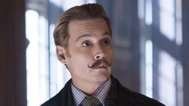 Gwyneth Paltrow and Johnny Depp in a scene from the movie Mortdecai. Roadshow Films