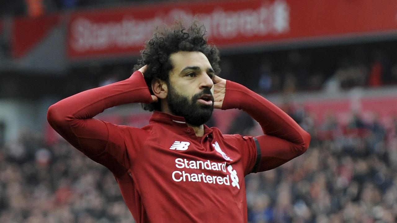 Liverpool's Mohamed Salah celebrates after scoring his side's second goal