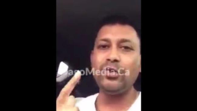 The man in the video who appears to threaten the UberX driver. Source: Facebook.