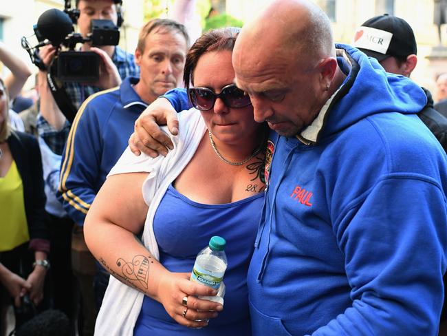 Olivia Campbell’s step-father Paul comforts the teen’s mum, Charlotte. Picture: Jeff J Mitchell/Getty Images