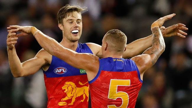 MELBOURNE, AUSTRALIA - APRIL 09: Josh Schache of the Lions (left) celebrates a goal with Mitch Robinson of the Lions during the 2017 AFL round 03 match between the St Kilda Saints and the Brisbane Lions at Etihad Stadium on April 09, 2017 in Melbourne, Australia. (Photo by Adam Trafford/AFL Media/Getty Images)