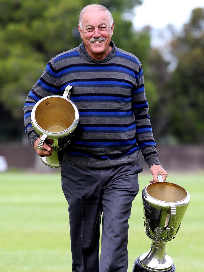 Malcolm Blight with the two premiership cups he won at Adelaide. Picture: Sarah Reed