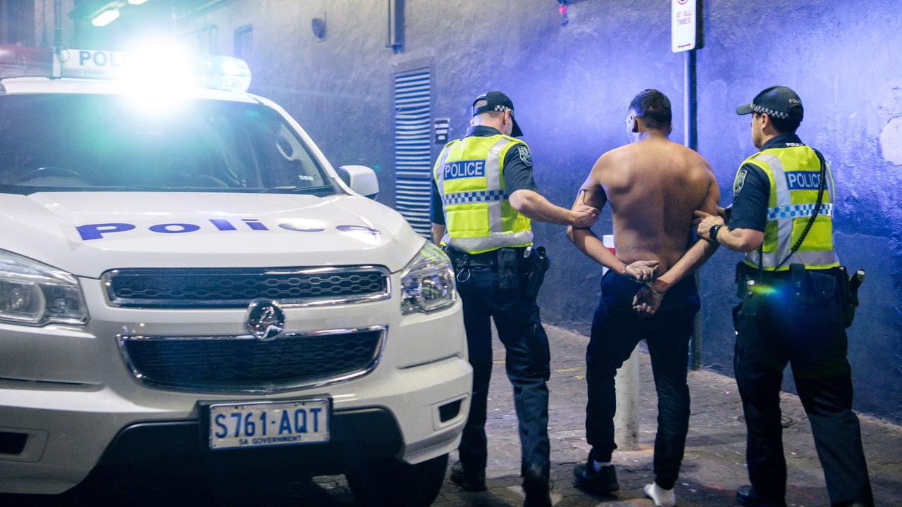 Police make an arrest on Hindley St just after midnight. Picture: AAP Image/ Morgan Sette