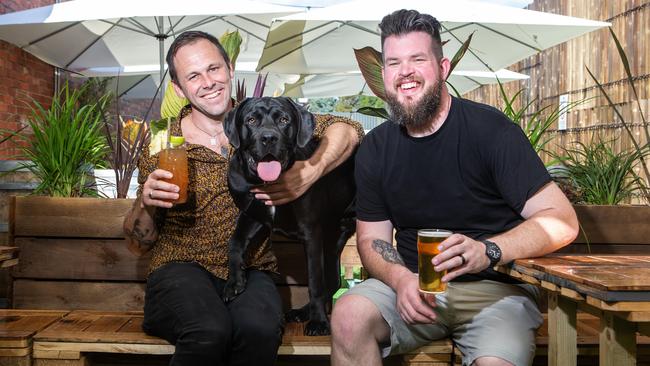 The Ten Saints owners James Marshall and John Wooster love their rums — and dogs. Picture: Sarah Matray