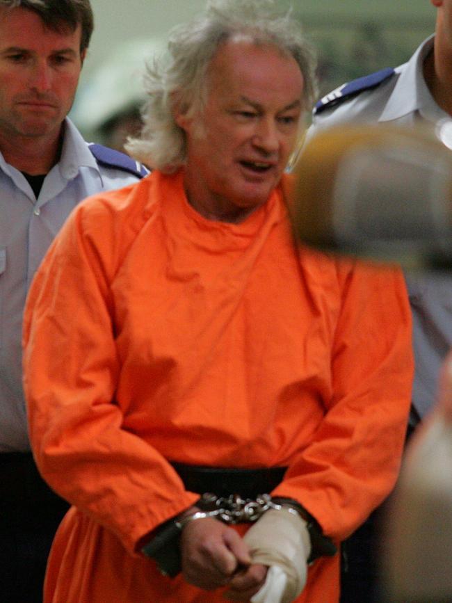 Ivan Milat being returned to jail after cutting off his own finger.