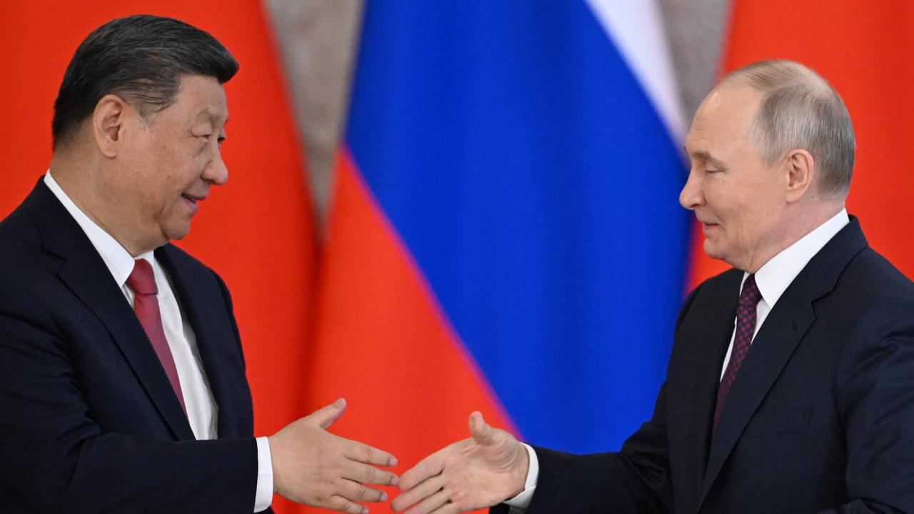 ‘Dear friend’: Putin, Xi rail against West