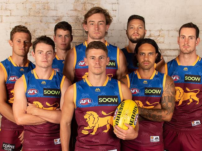 BRISBANE, AUSTRALIA - FEBRUARY 14: Brisbane Lions leadership group (L-R) Ryan Lester, Lachie Neale, Jarrod Neale, captain Dayne Zorko (front centre), vice-captain Harris Andrews, Stefan Martin, Allen Christensen and Darcy Gardiner pose for a photograph during the Brisbane Lions AFL Leadership Announcement at Triple M Studios on February 14, 2019 in Brisbane, Australia. (Photo by Albert Perez/AFL Media/Getty Images)