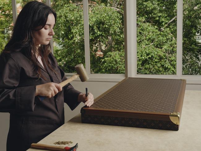 An artisan in the Louis Vuitton trunk atelier.