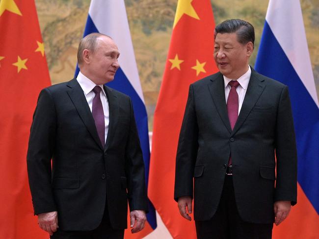 Russian president Vladimir Putin Xi Jinping pose during their meeting in Beijing in February. Picture: Alexei Druzhinin / Sputnik / AFP