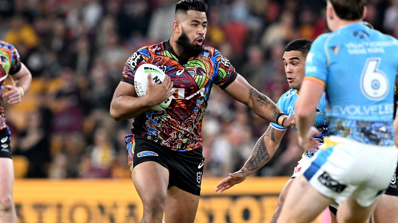 BRISBANE, AUSTRALIA - MAY 27: Payne Haas of the Broncos takes on the defence during the round 12 NRL match between the Brisbane Broncos and the Gold Coast Titans at Suncorp Stadium, on May 27, 2022, in Brisbane, Australia. (Photo by Bradley Kanaris/Getty Images)