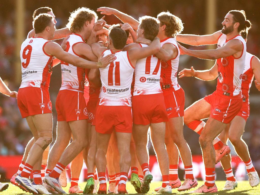 Sydney players rushed from everywhere to celebrate the moment with Parker. Picture: Matt King/Getty Images