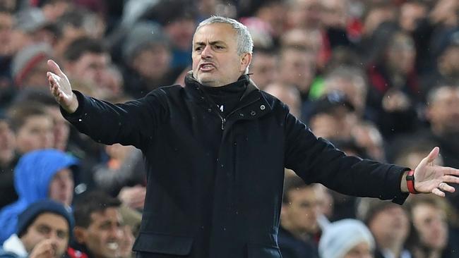 Manchester United's Portuguese manager Jose Mourinho gestures on the touchline during the English Premier League football match between Liverpool and Manchester United at Anfield in Liverpool, north west England on December 16, 2018. (Photo by Paul ELLIS / AFP) / RESTRICTED TO EDITORIAL USE. No use with unauthorized audio, video, data, fixture lists, club/league logos or 'live' services. Online in-match use limited to 120 images. An additional 40 images may be used in extra time. No video emulation. Social media in-match use limited to 120 images. An additional 40 images may be used in extra time. No use in betting publications, games or single club/league/player publications. /