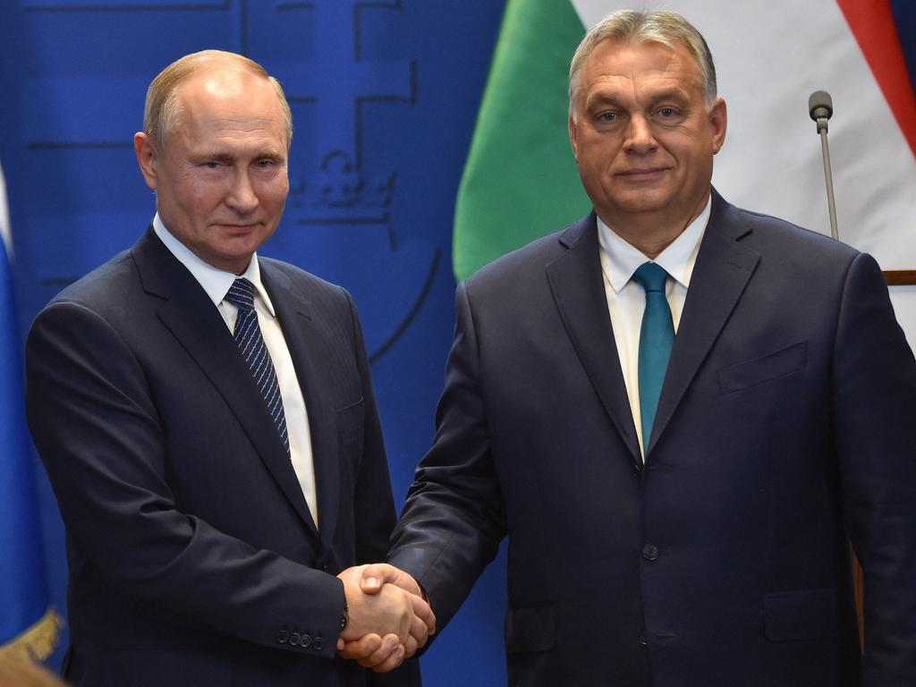 Hungarian Prime Minister Viktor Orban (R) and Russian President Vladimir Putin shake hands after a press conference in 2019. Hungary has sided with Russia over Ukraine. Picture: AFP