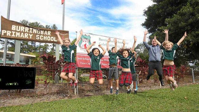 JUMP TO IT: Burringbar Principal Peter Halloran with students Abi, Lonnie, Amber, Flynn, Ethan and Charlie get in the spirit of the upcoming 125th school reunion. Picture: Scott Powick