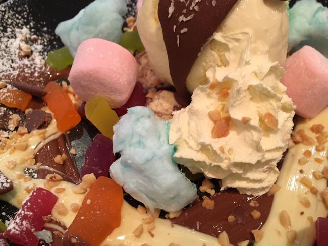 Justinian's Cafe and Dessert Bar’s The Dessertarian — deconstructed rocky road served with vanilla ice cream topped with whipped cream and fairy floss. Picture: Jenifer Jagielski