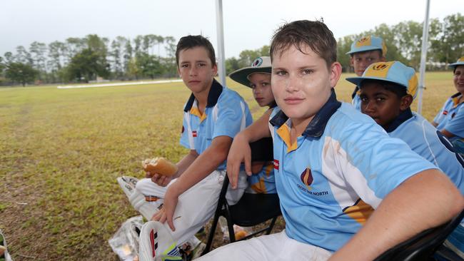 Far North Cricket U12's players Morgan Black, Brashar Coutts, Matthew Wilkins and Aiden Carson waiting out a rain delay. PICTURE: STEWART McLEAN