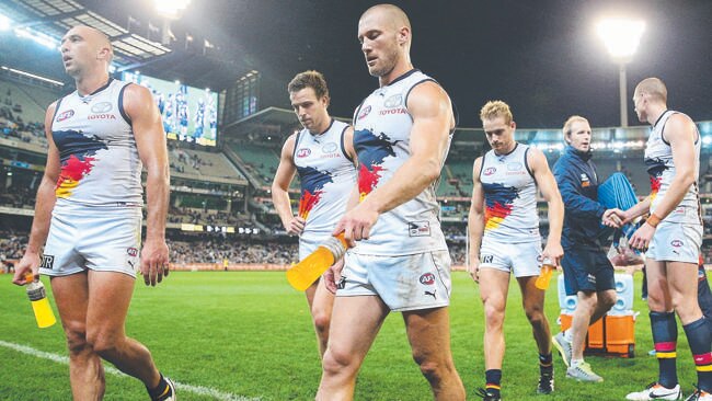 The Crows leave the MCG after losing to Carlton. Picture: Michael Dodge.