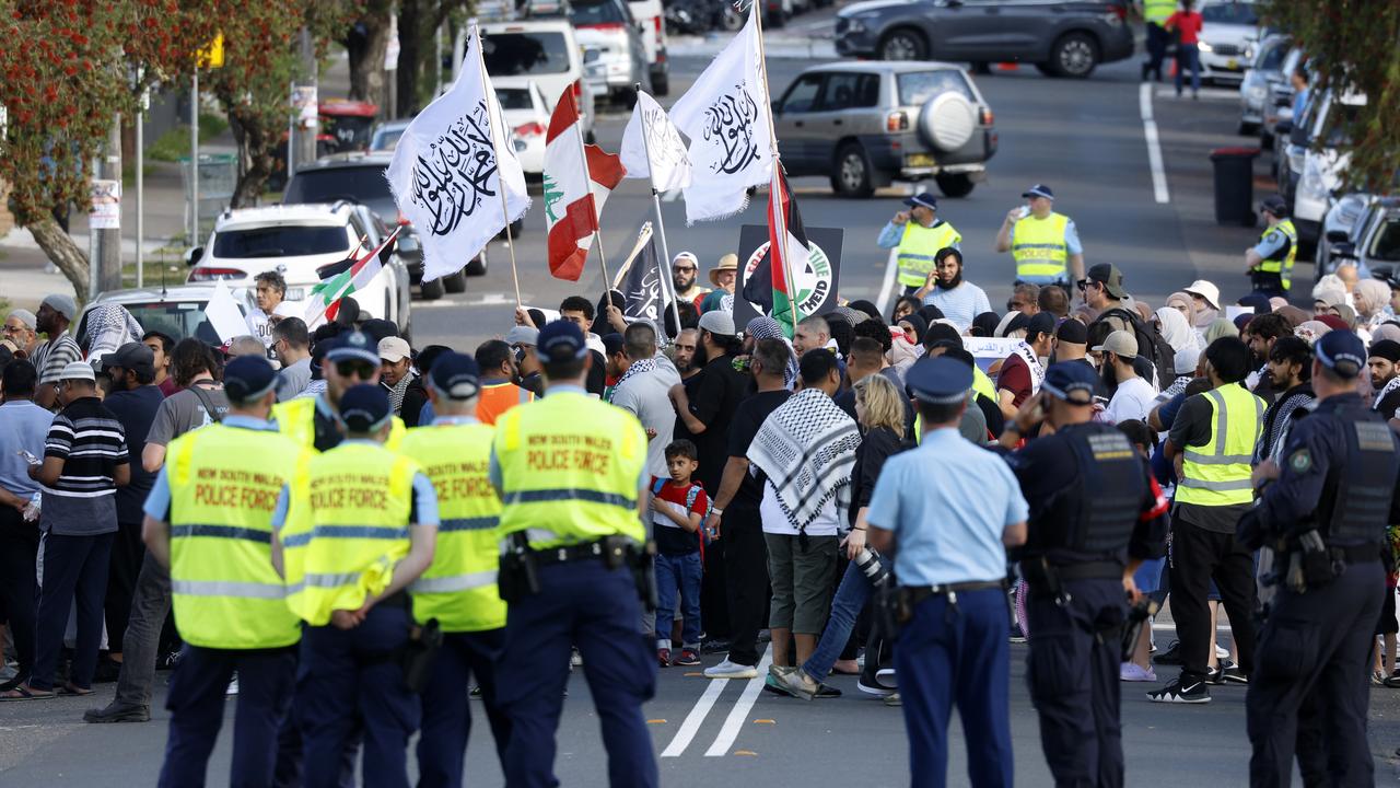 Cops gather as city holds its breath amid Oct 7 vigils