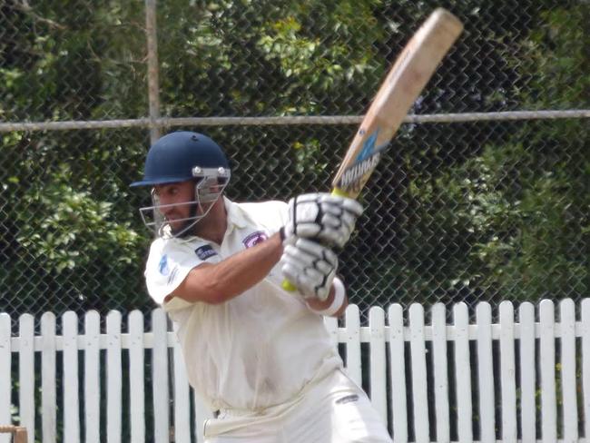 Adam Ezekiel in full flight on his way to a century. Picture: Barry Clarence