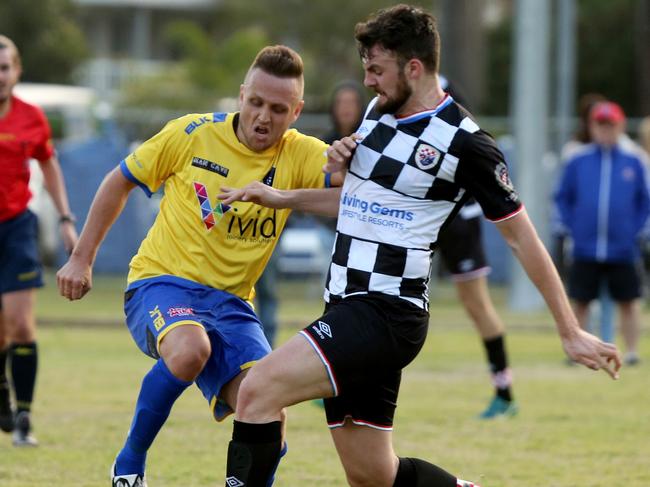 Broadbeach United’s Shaun Robinson (left) scored a hat-trick yesterday. Picture: Mike Batterham