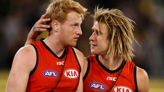 Aaron Francis gets some encouragement from skipper Dyson Heppell.