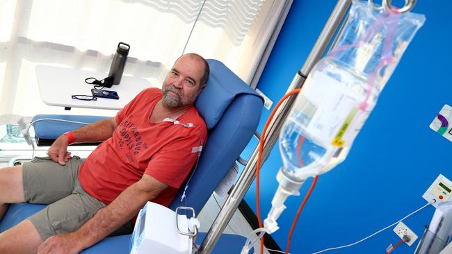 Damien Holt receiving some cancer treatment at the Icon Cancer centre in Chermside. Picture David Clark