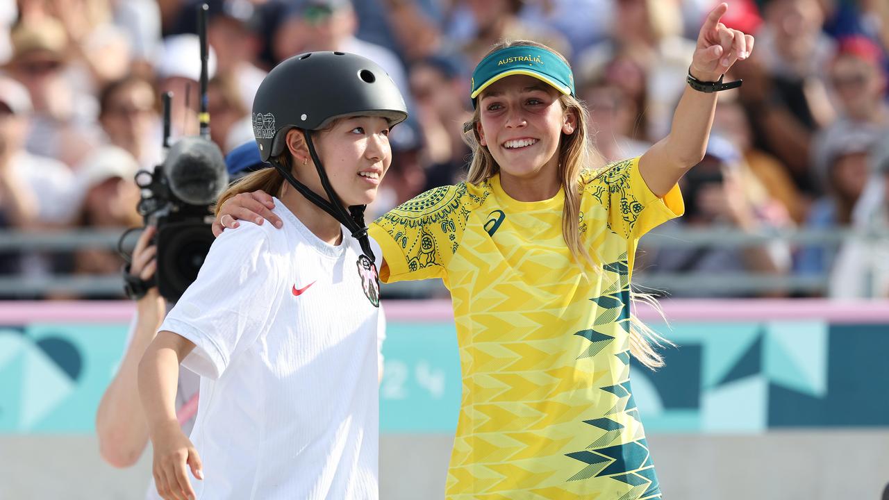Coco Yoshizawa from Japan won the gold and is pictured being congratulated by Chloe Covell. Picture: Adam Head