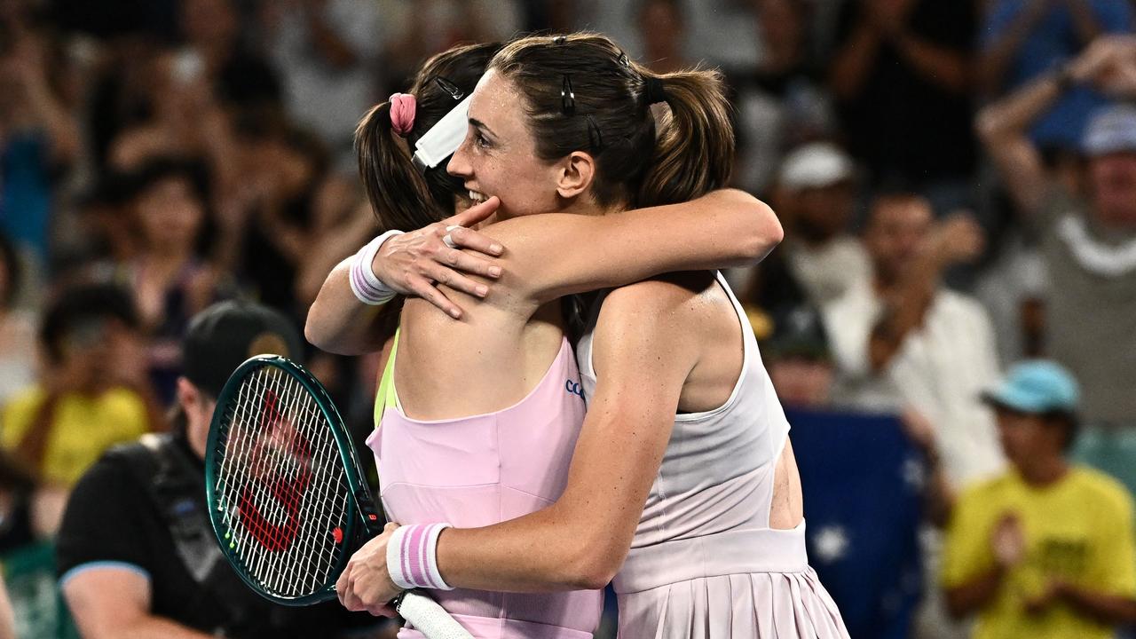 Croatia's Petra Martic (R) hugs Tomljanovic after their match. Picture: AFP