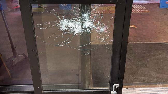 Damage to one of the service station doors. Picture: Supplied