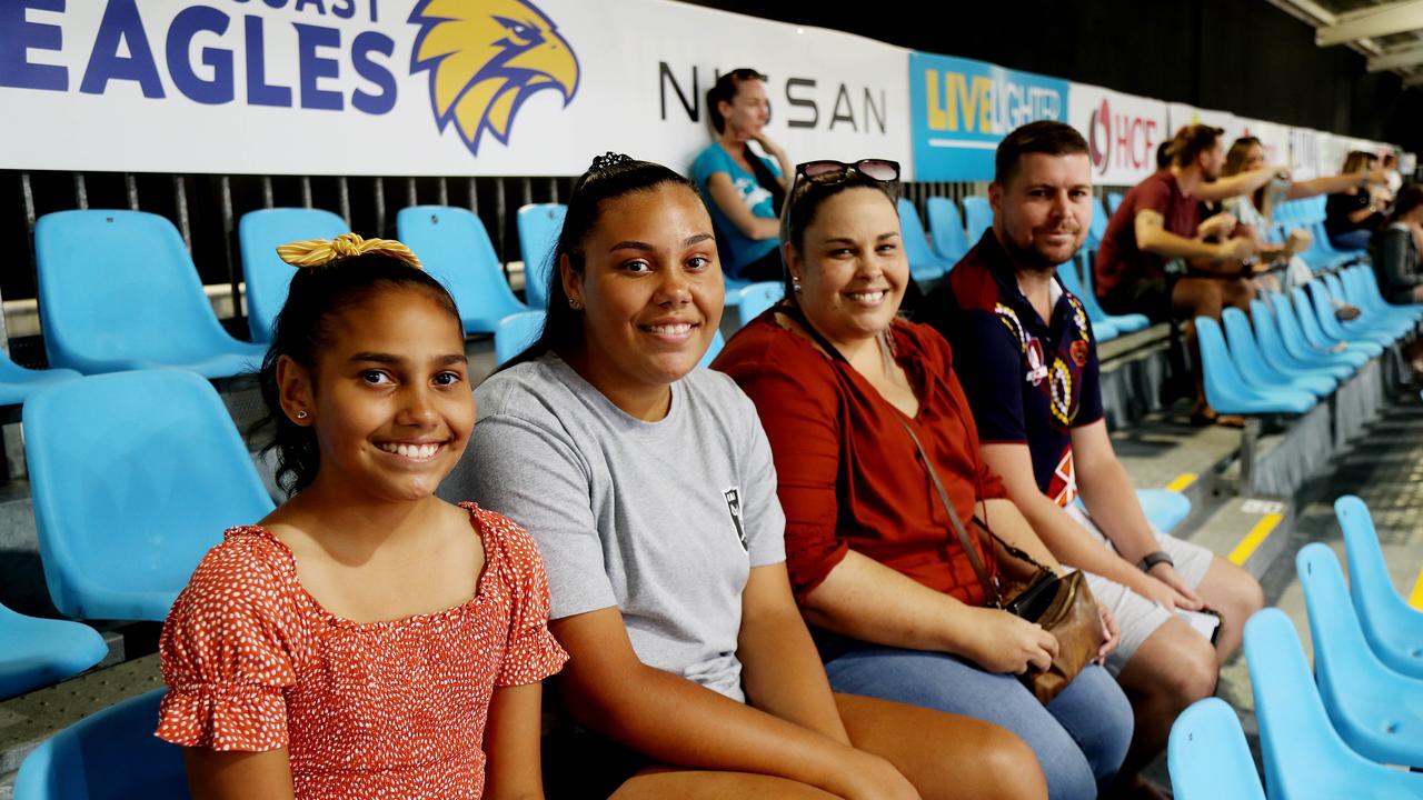 Super Netball game between Fever and Giants at Cairns pop up stadium. Georgia, 12, Chunlla, 13, and Sharon Keating with Robert English. PICTURE: STEWART McLEAN