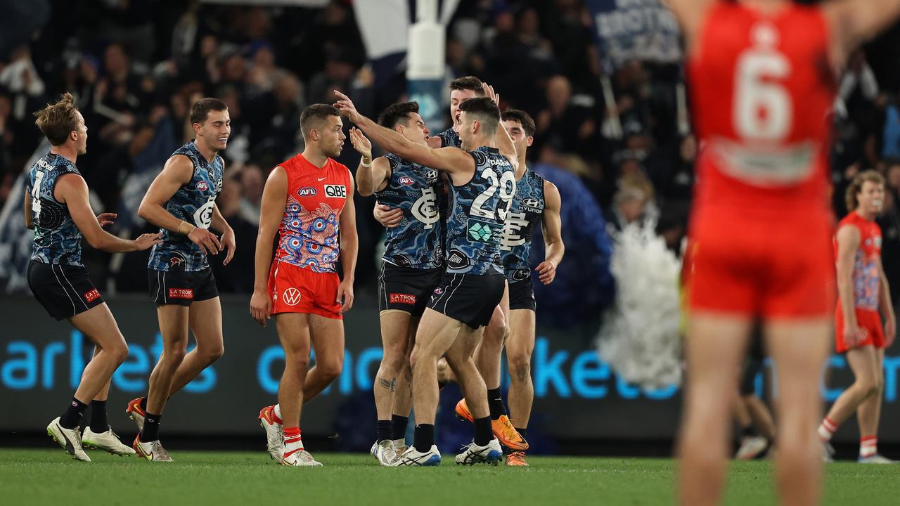 Zac Fisher celebrates with teammates. Picture: Robert Cianflone