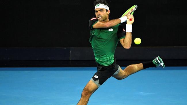 Portugal's Frederico Ferreira Silva hits a return against Nick Kyrgios. Picture: AFP.