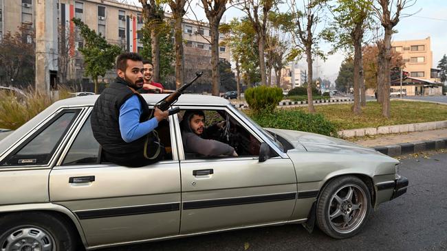 Locals take to the streets. Picture: Louai Beshara/AFP