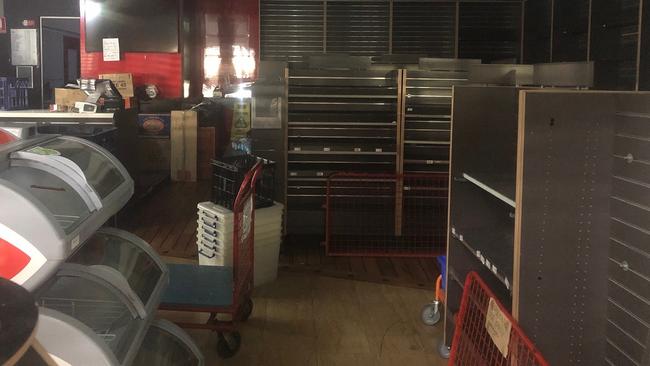 Empty shelves inside the NewsLink newsagency. Picture: Jim O'Rourke