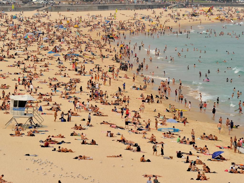 Sunbathers are seen on Bondi Beach in 2019, which was among the eight hottest years on record. Picture: AFP