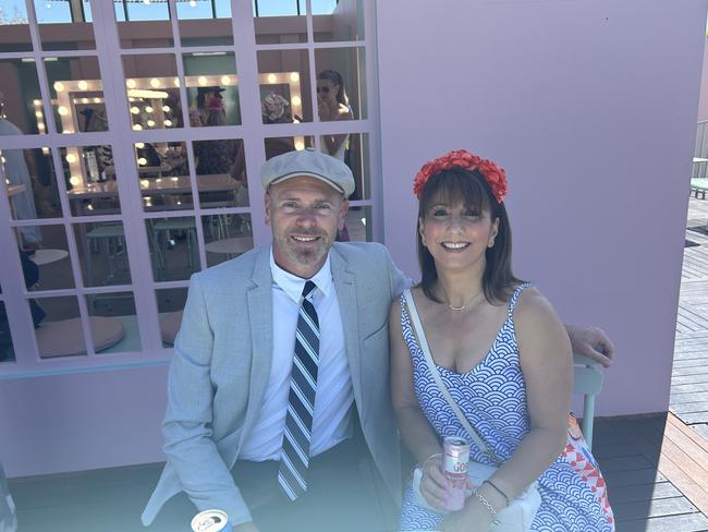 Tania Georgeou and Scott Barrett enjoying the Melbourne Cup. Picture: Oscar Jaeger