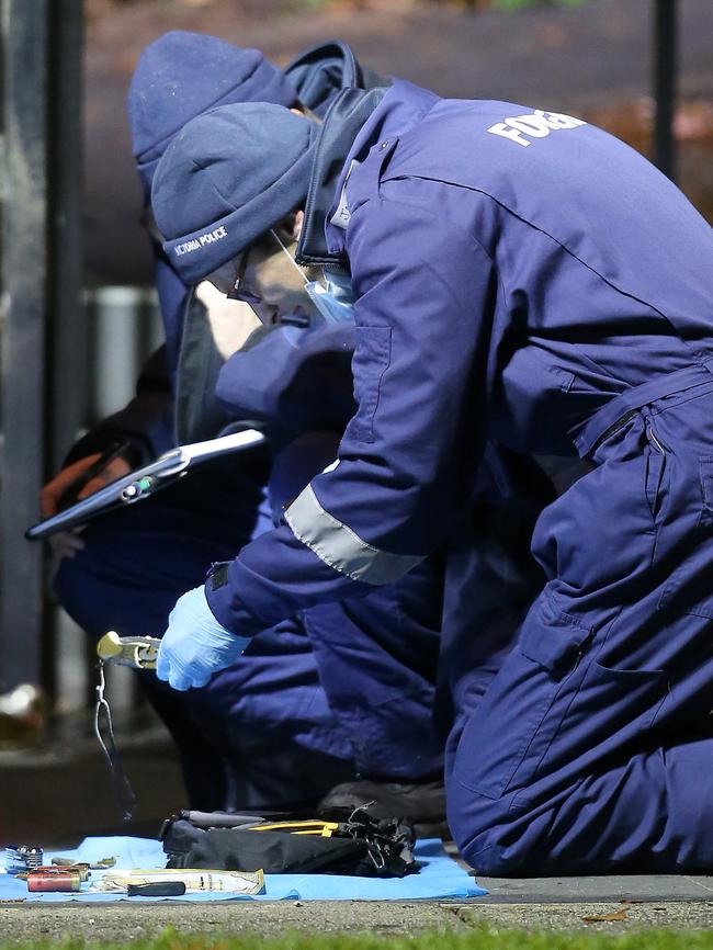 Forensics with evidence at the scene. Picture: Yuri Kouzmin