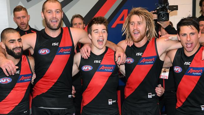 Adam Saad, Tom Bellchambers, Zach Merrett, Dyson Heppell and Mark Baguley are fired up after a Bombers win. Picture: Getty Images