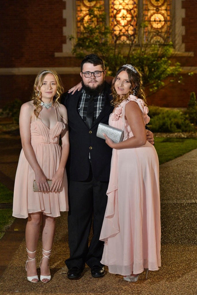 At Toowoomba Flexi School formal are (from left) Celestia Cooper-Arday, Lawrence Little and graduate Mickayla Sayers at Empire Theatres, Thursday, November 9, 2017. Picture: Kevin Farmer