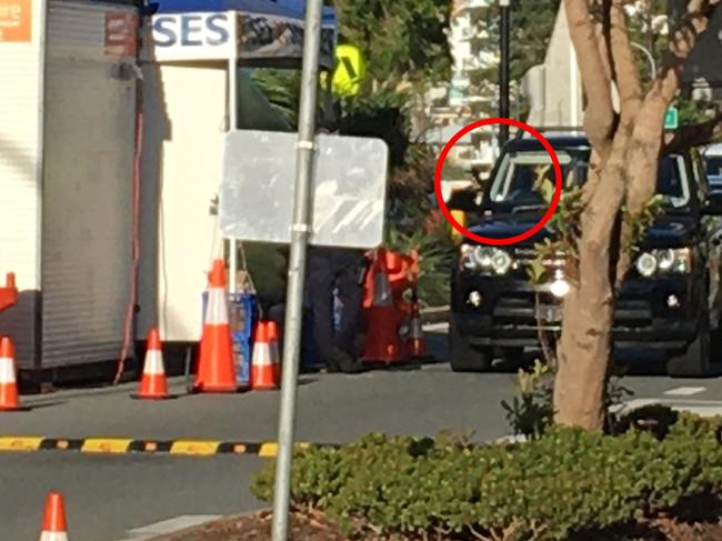 A driver passes through a checkpoint at Coolangatta showing their border declaration pass on their mobile phone. Picture: NCA NewsWire / Darren Cartwright