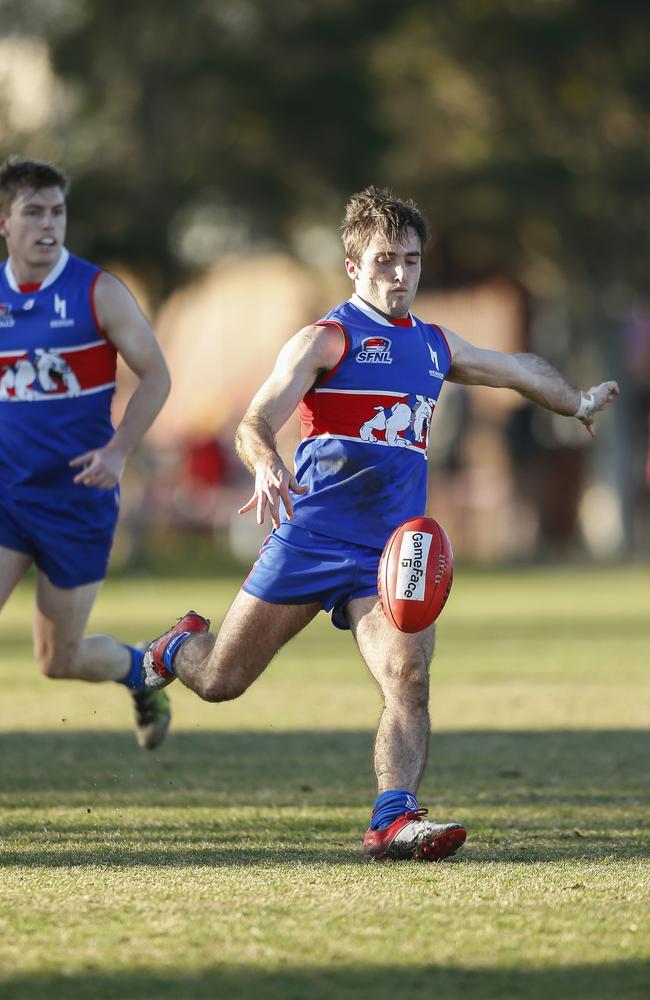 Jaye Edmunds boots St Paul's forward.