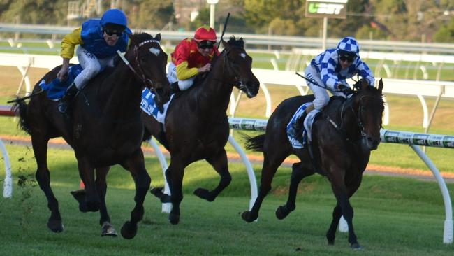 Black Heart Bart storms past Admiral (rails) to win the Group 1 Goodwood at Morphettville. Picture: Tasracing