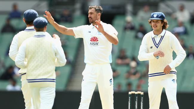 Mitchell Starc of NSW celebrates the wicket of Marcus Harris. Picture: Robert Prezioso/Getty Images