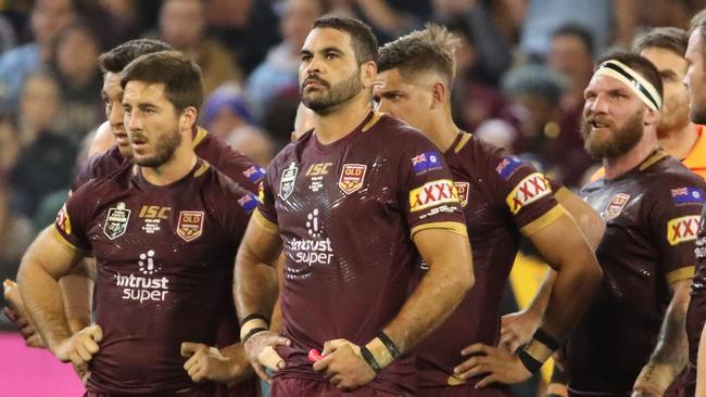 Greg Inglis and the Maroons look dejected after a Blues try. Picture: Getty Images