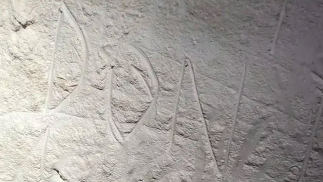 The vandals scratched words into the cave art: ‘don’t look now, but this is a death cave’. Picture: Instagram