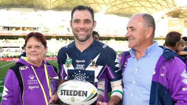 NRL legend Cameron Smith with his mum Sonia and dad Wayne after playing his 350th game in 2017. Picture: Getty Images