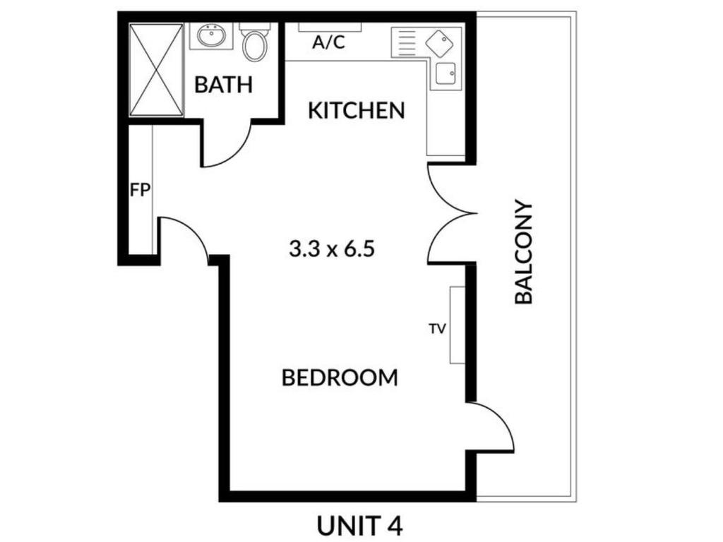 A boxy North Adelaide apartment featuring its own glass shower smack bang in the middle of the kitchen has listed for $400