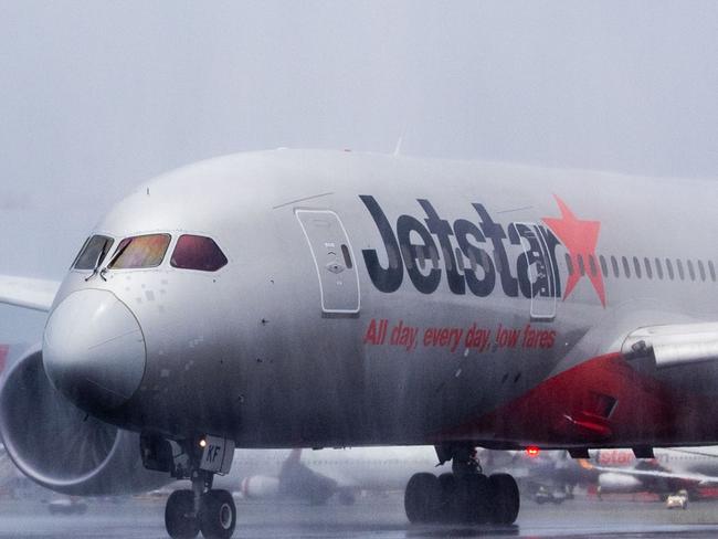 Jetstar Flight JQ49 – the inaugural direct flight to Seoul – gets the traditional water-cannon salute at Gold Coast Airport. Picture: Luke Marsden