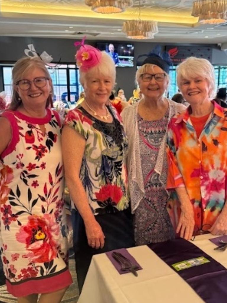 Sylvia Brumke, Wendy Ireland, Cheryl Depeau, and Lyn Hill celebrating the Melbourne Cup at Gympie RSL Club.