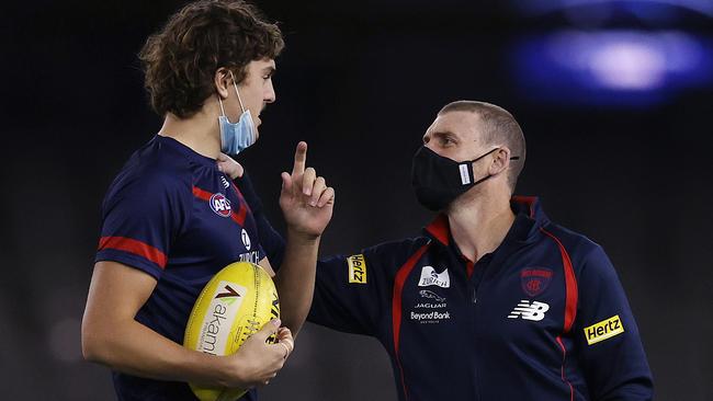 Demons coach Simon Goodwin talks with young big man Luke Jackson earlier this season. Picture: Michael Klein